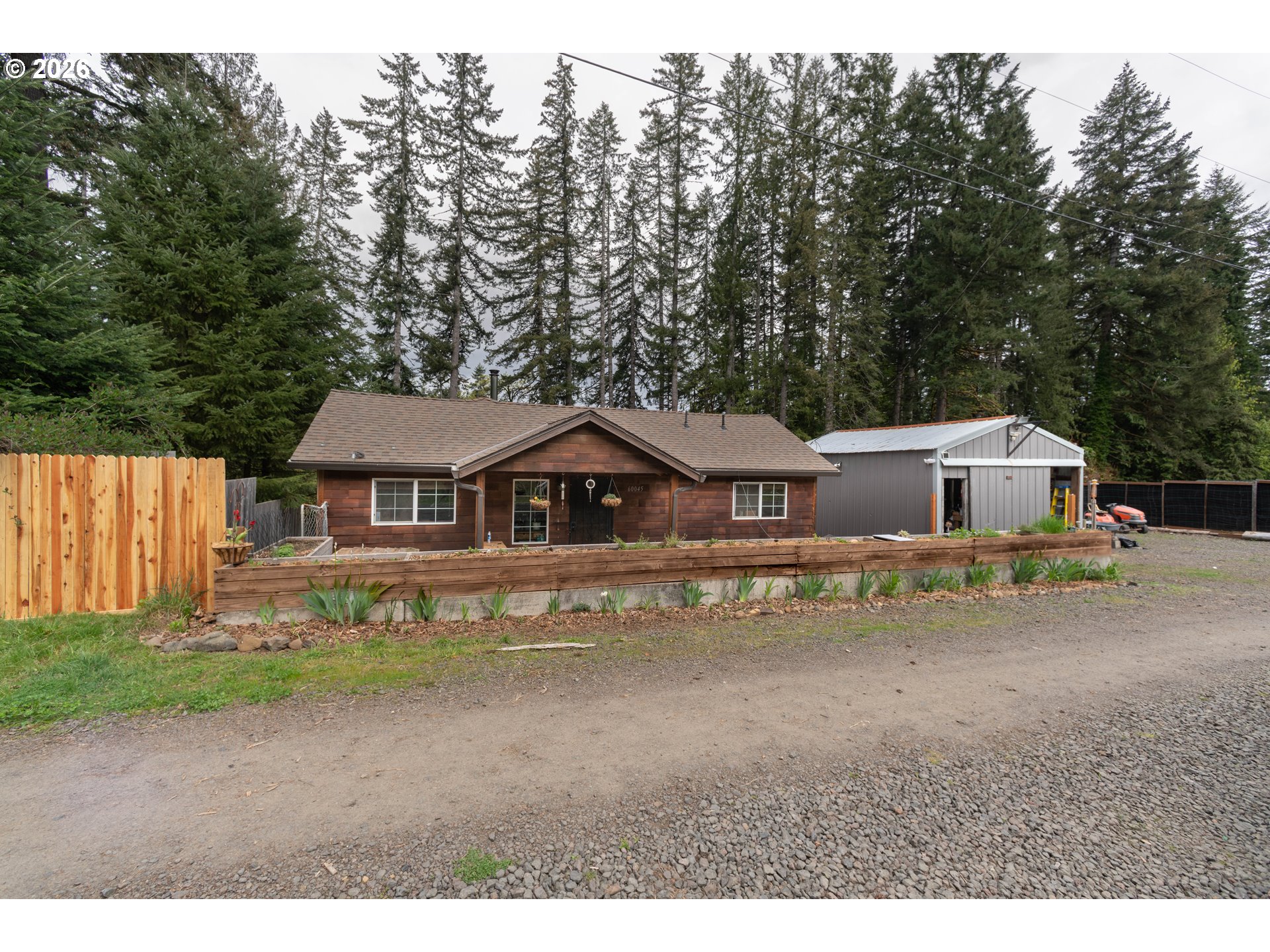 60045 Northwest Railroad Avenue Timber, OR 97144 - Photo 1 of 41 a house with a outdoor space
