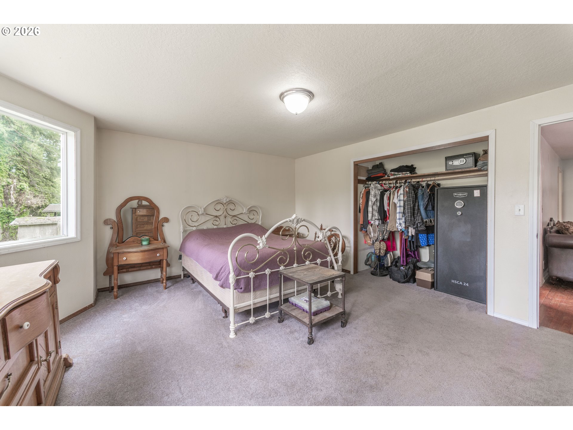 60045 Northwest Railroad Avenue Timber, OR 97144 - Photo 14 of 41 a bedroom with furniture and a window
