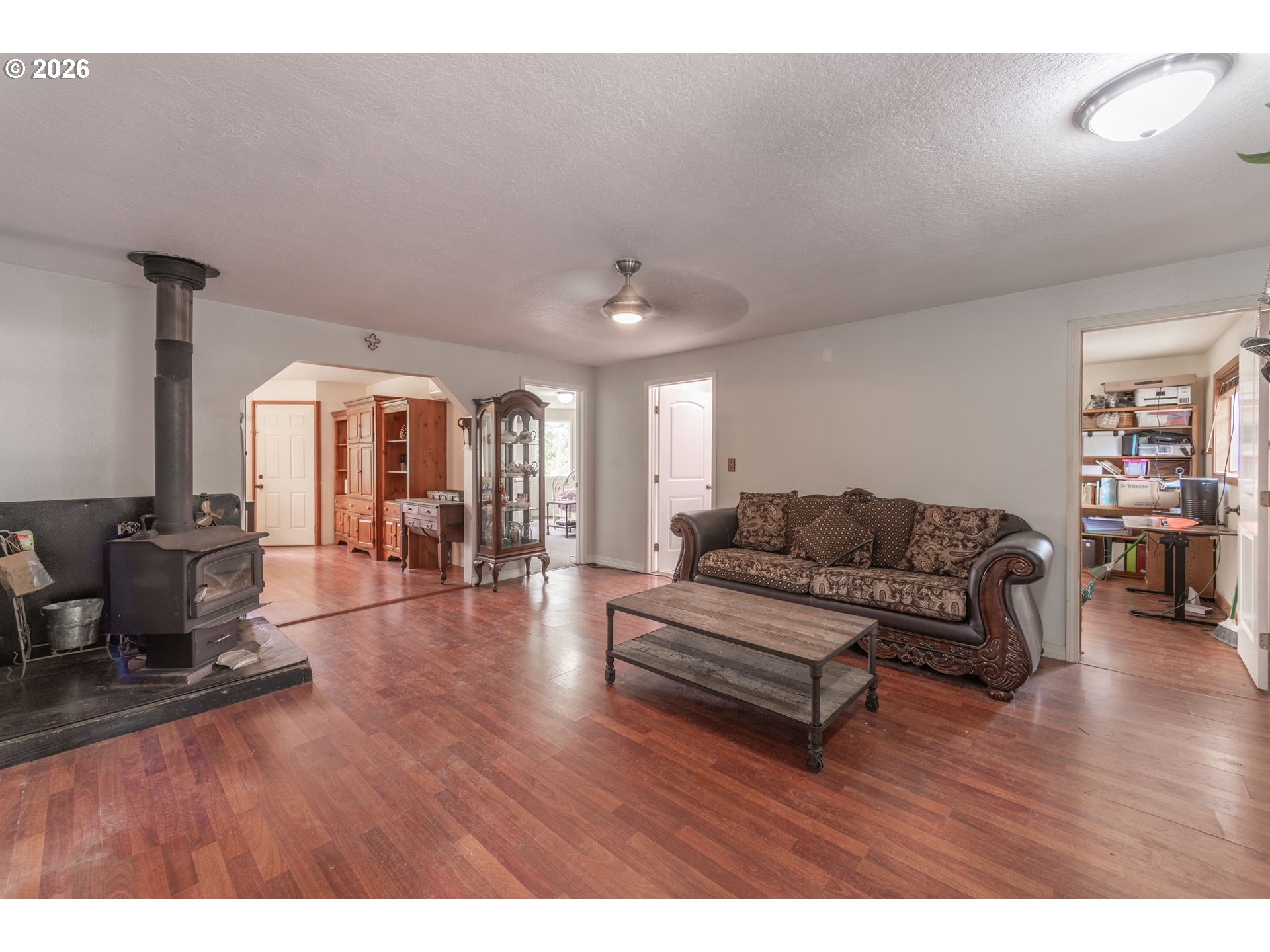 60045 Northwest Railroad Avenue Timber, OR 97144 - Photo 6 of 41 a living room with furniture and a wooden floor