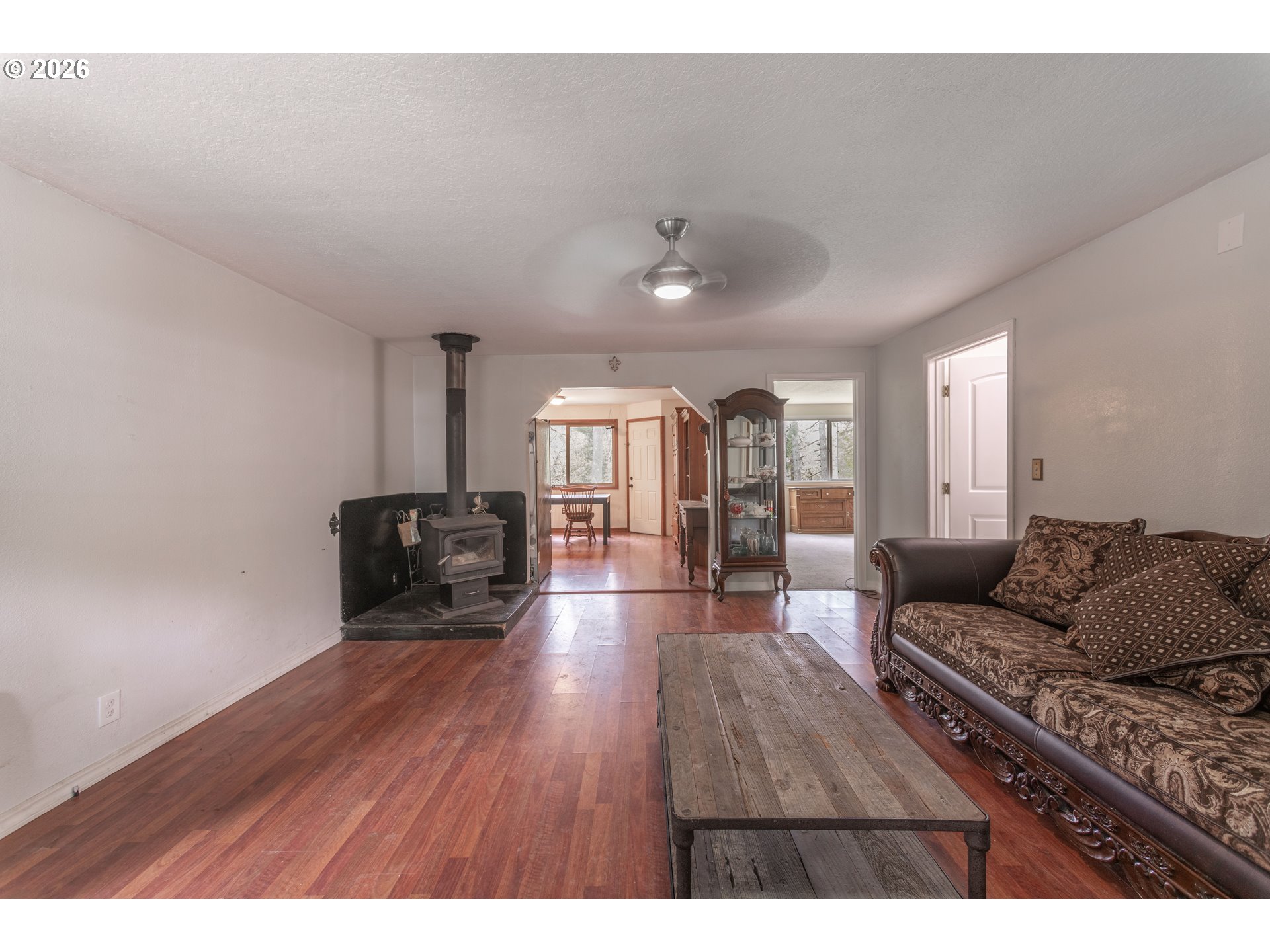 60045 Northwest Railroad Avenue Timber, OR 97144 - Photo 9 of 41 a living room with furniture and a wooden floor