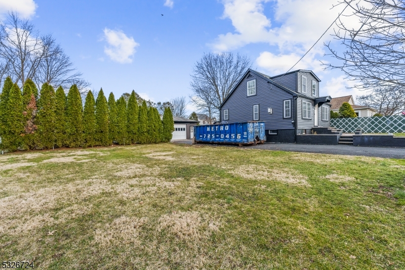 147 Chestnut Street Bridgewater, NJ 08807 - Photo 12 of 13 a view of a house with a big yard