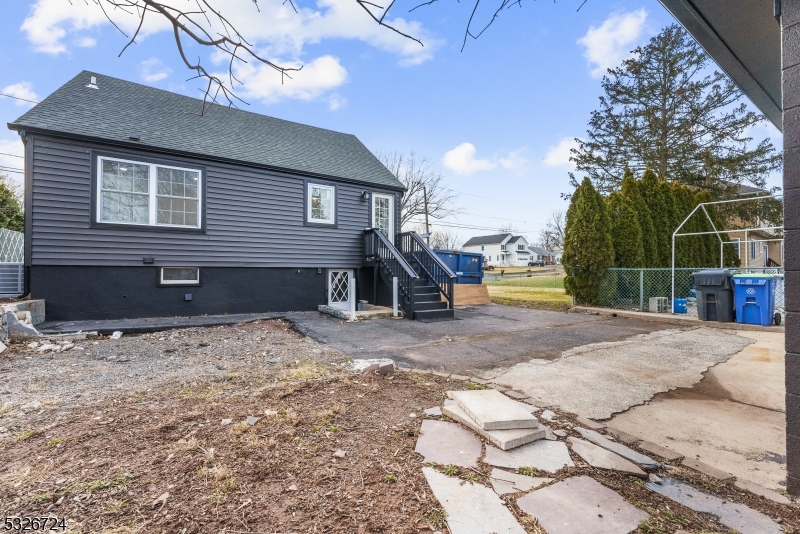 147 Chestnut Street Bridgewater, NJ 08807 - Photo 13 of 13 a front view of a house with a yard