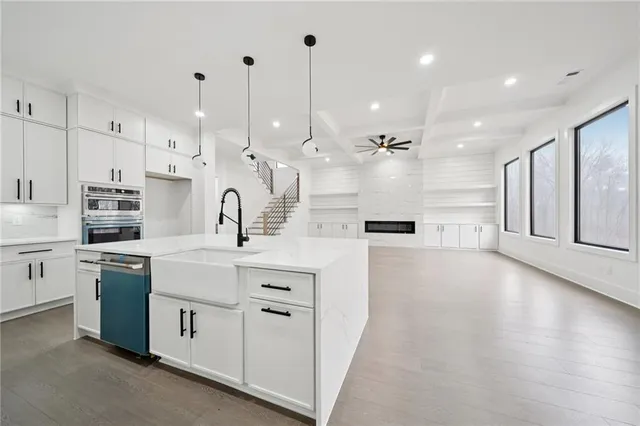 a large kitchen with cabinets