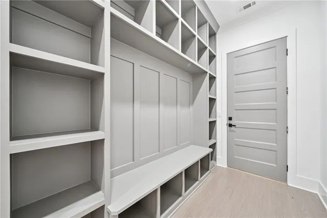 a view of an empty walk in closet