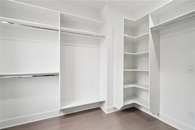a view of an empty walk in closet