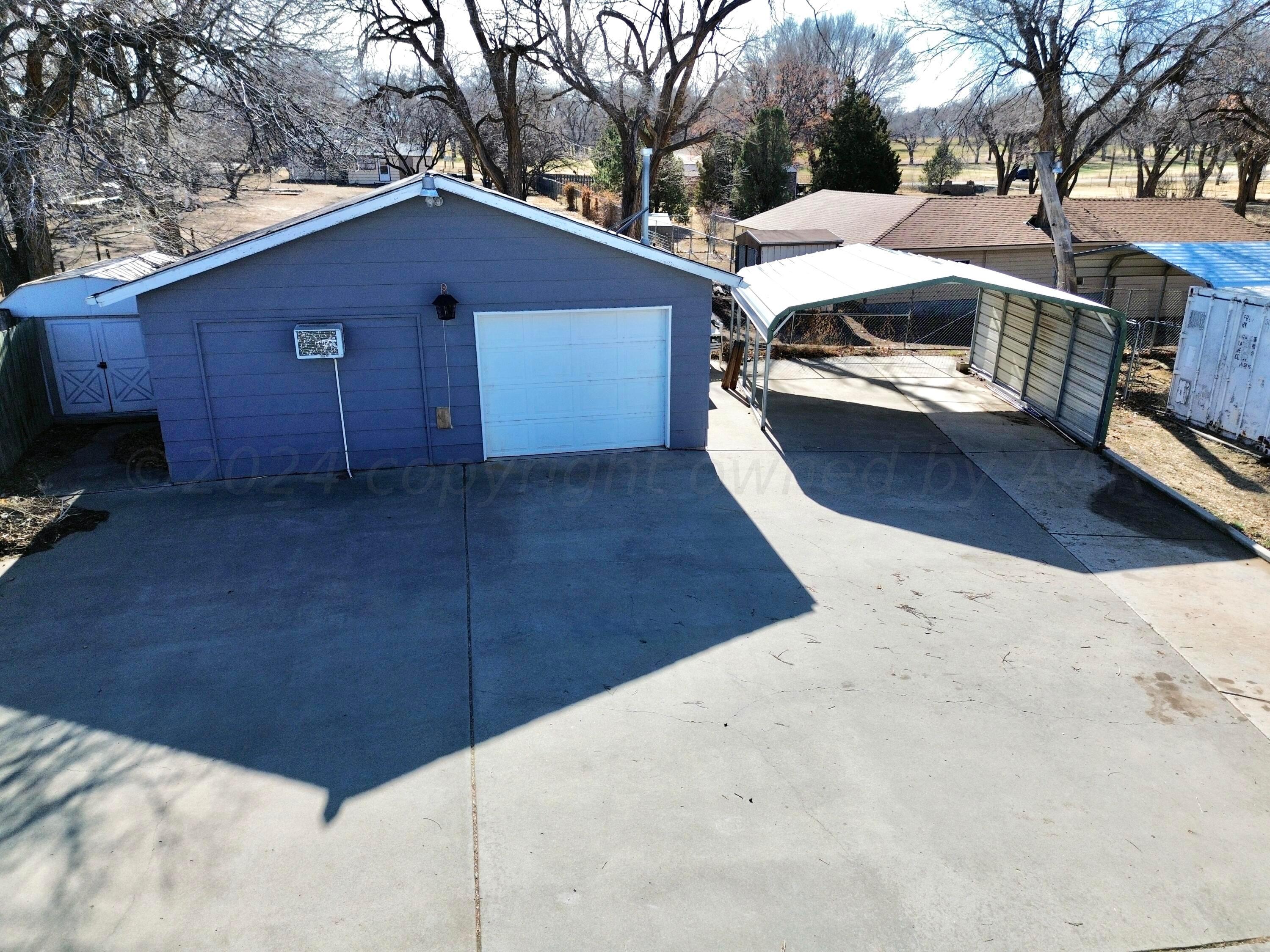 531 West Studebaker Avenue Amarillo, TX 79108 - Photo 6 of 25 a view of a house with a snow in the yard