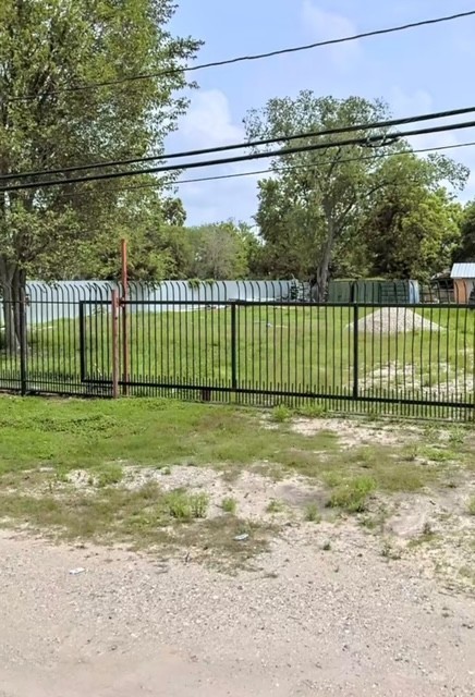 4310 Bennington Street Houston, TX 77016 - Photo 2 of 6 a view of a yard with a wooden fence
