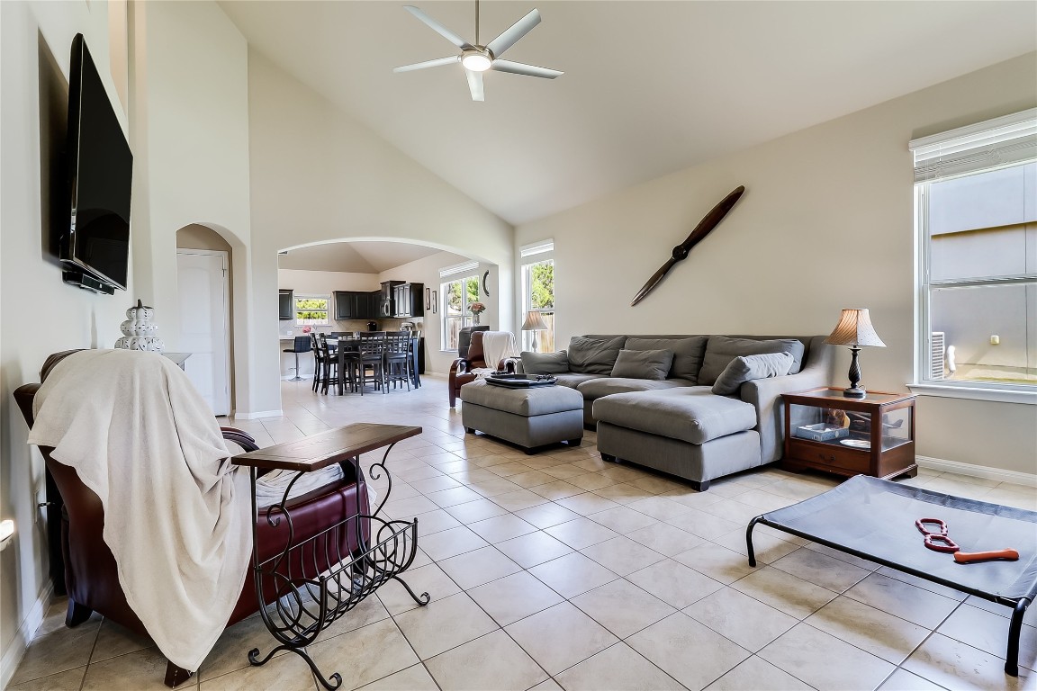 1425 Hamiltons Way Leander, TX 78641 - Photo 1 of 38 a living room with furniture and a flat screen tv