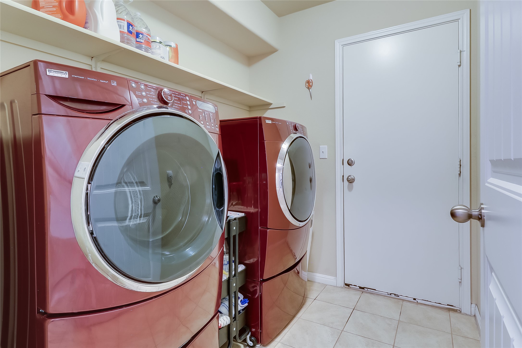 1425 Hamiltons Way Leander, TX 78641 - Photo 13 of 38 a utility room with dryer and washer