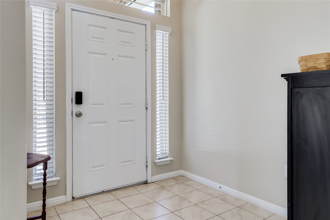 1425 Hamiltons Way Leander, TX 78641 - Photo 15 of 38 a view of an entryway with wooden floor