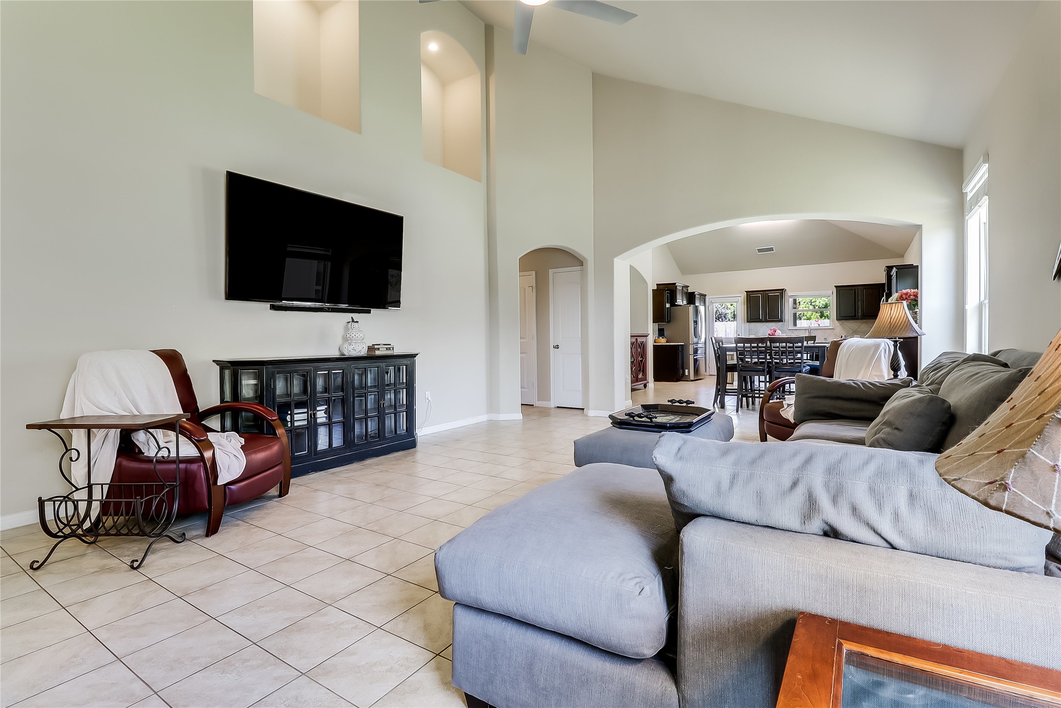 1425 Hamiltons Way Leander, TX 78641 - Photo 18 of 38 a living room with furniture and a flat screen tv