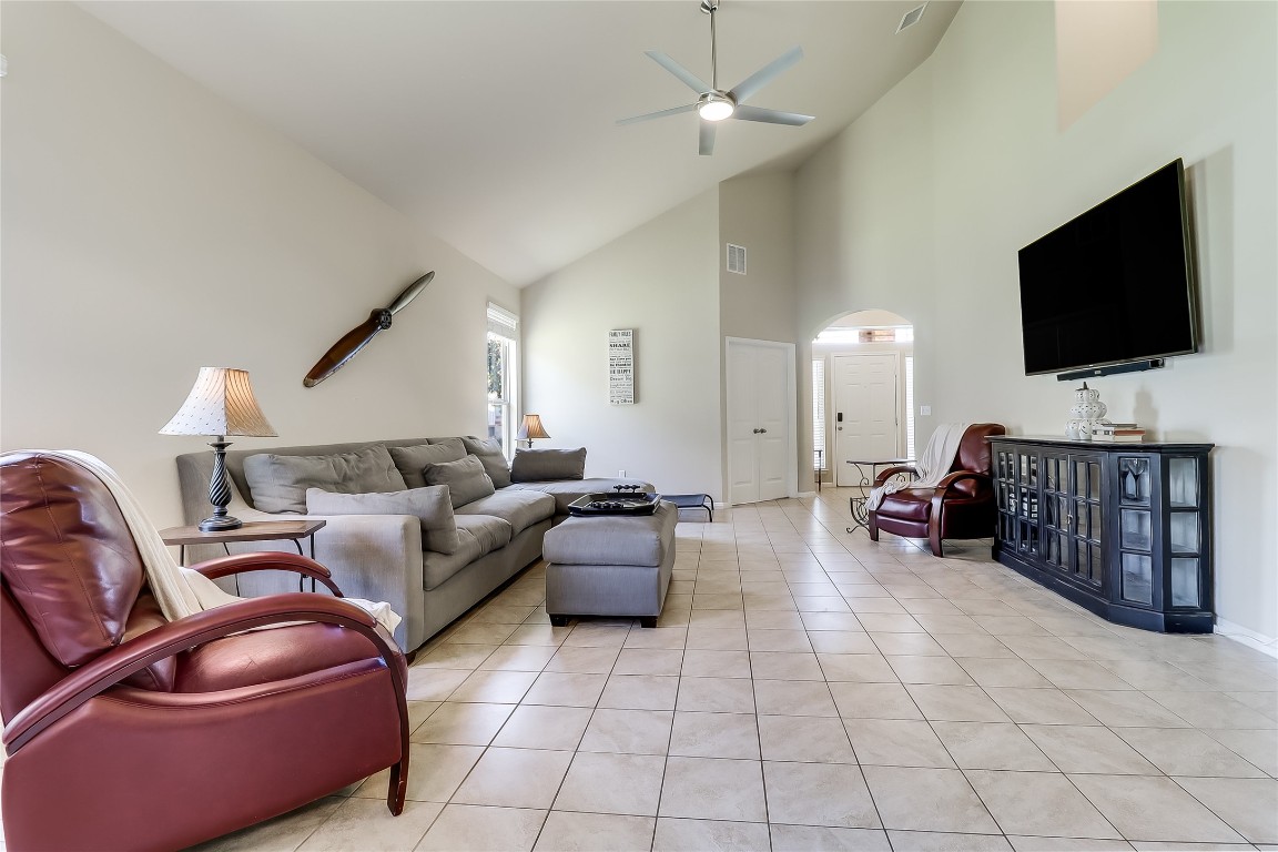 1425 Hamiltons Way Leander, TX 78641 - Photo 19 of 38 a living room with furniture and a flat screen tv