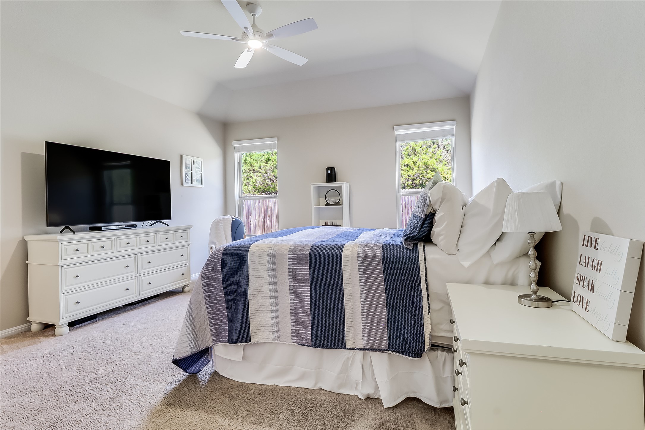 1425 Hamiltons Way Leander, TX 78641 - Photo 27 of 38 a bed room with furniture and flat screen tv