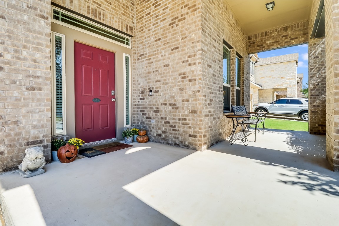 1425 Hamiltons Way Leander, TX 78641 - Photo 31 of 38 a balcony with table and chairs