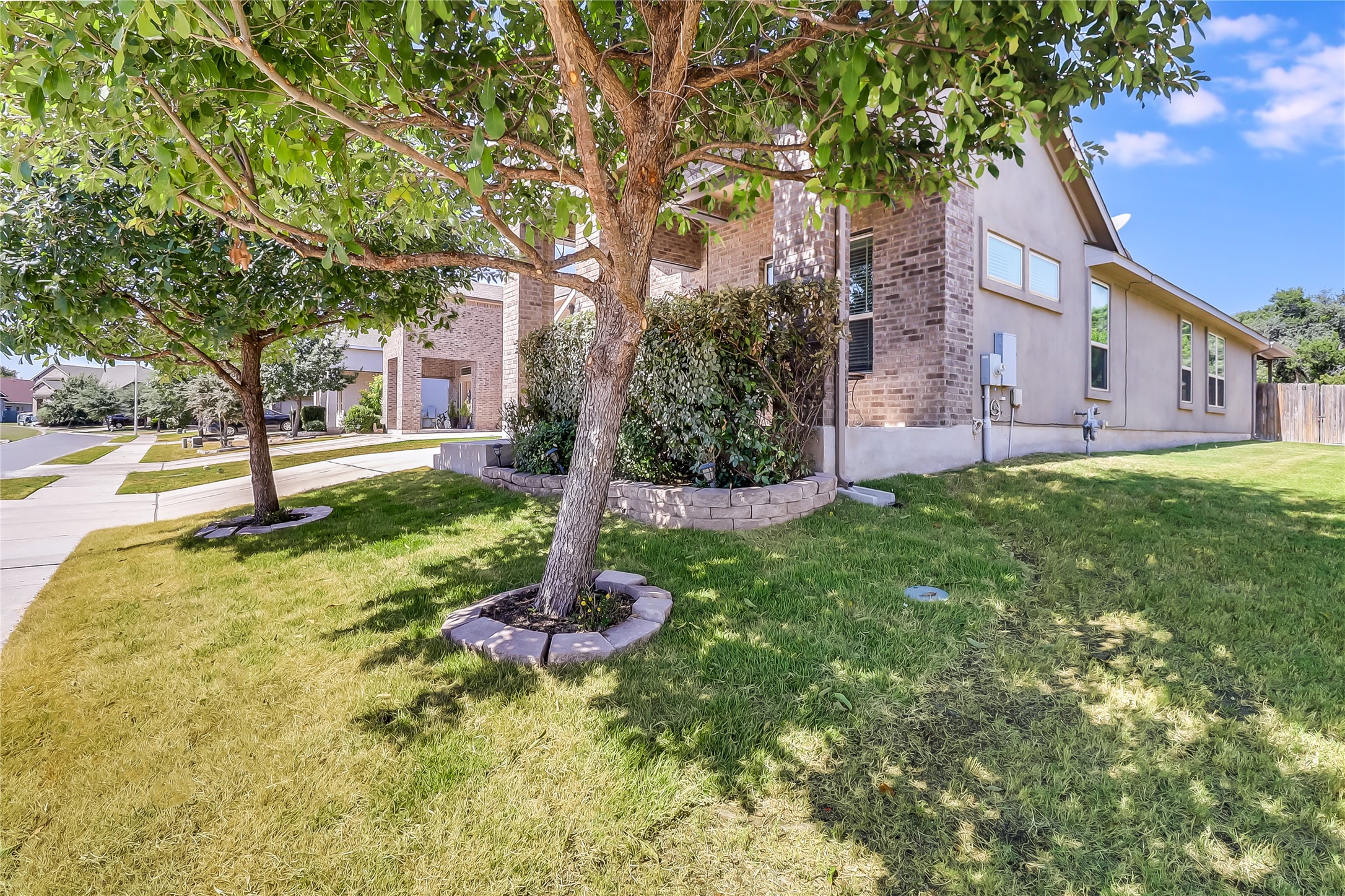 1425 Hamiltons Way Leander, TX 78641 - Photo 34 of 38 a front view of a house with a yard
