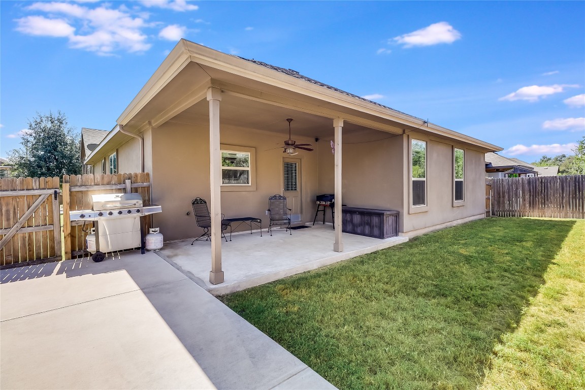 1425 Hamiltons Way Leander, TX 78641 - Photo 35 of 38 a view of a house with backyard and sitting area