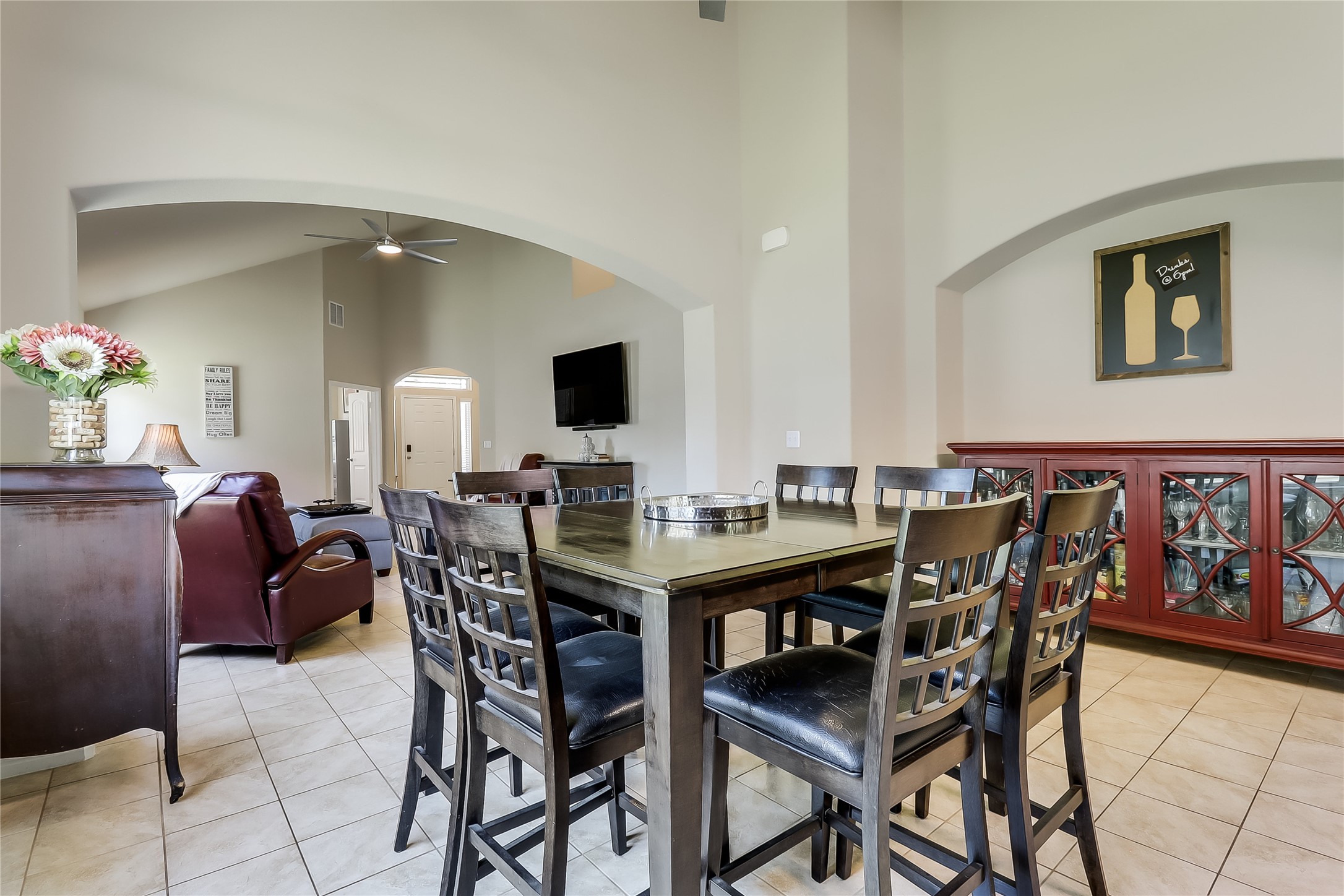 1425 Hamiltons Way Leander, TX 78641 - Photo 4 of 38 a view of a dining room with furniture and a potted plant