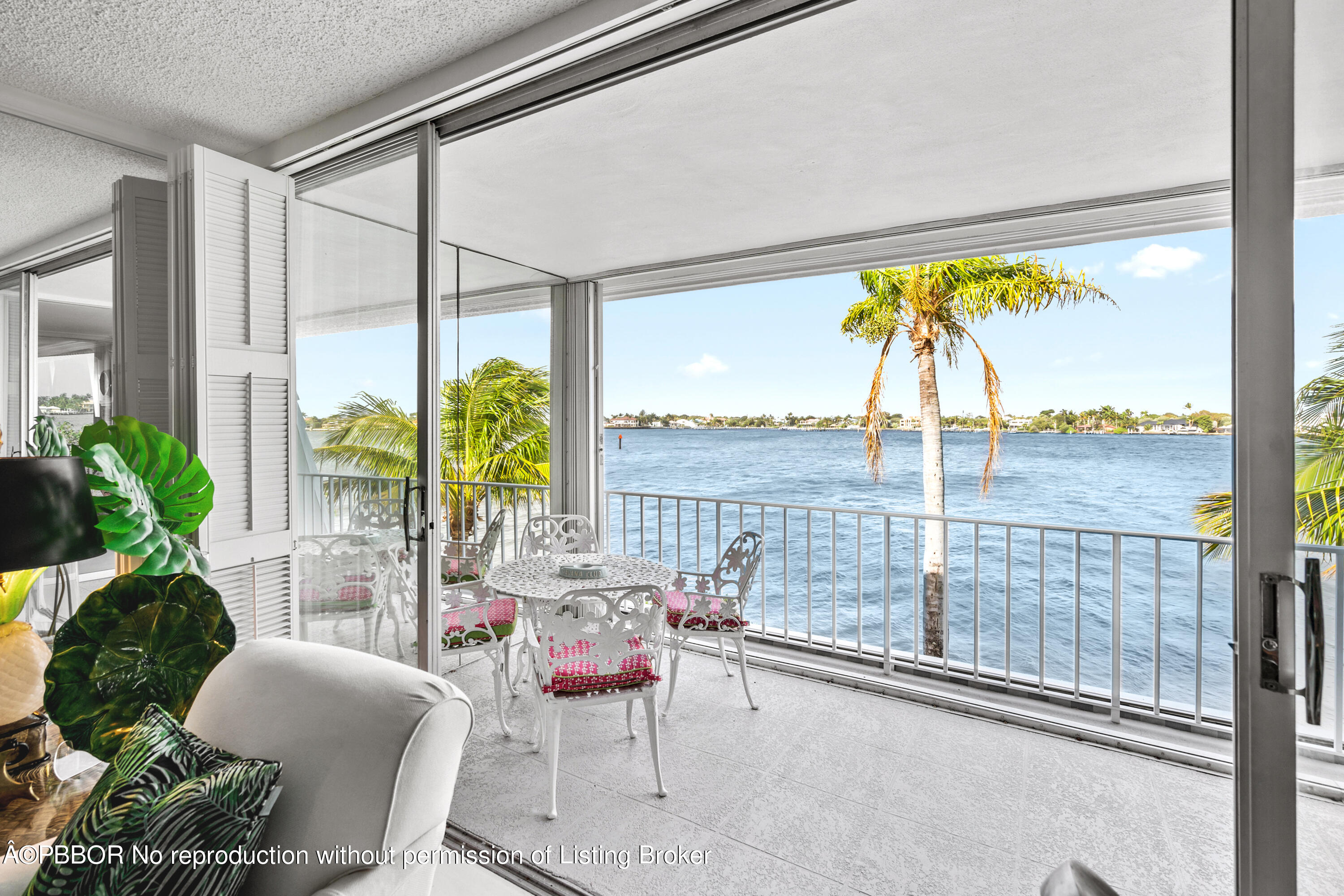 Undisclosed Address Palm Beach, FL 33480 - Photo 16 of 17 a living room with furniture and a floor to ceiling window