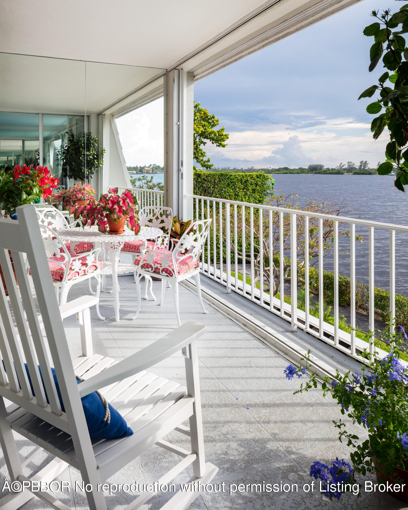 Undisclosed Address Palm Beach, FL 33480 - Photo 17 of 17 a view of a patio with wooden floor and outdoor seating
