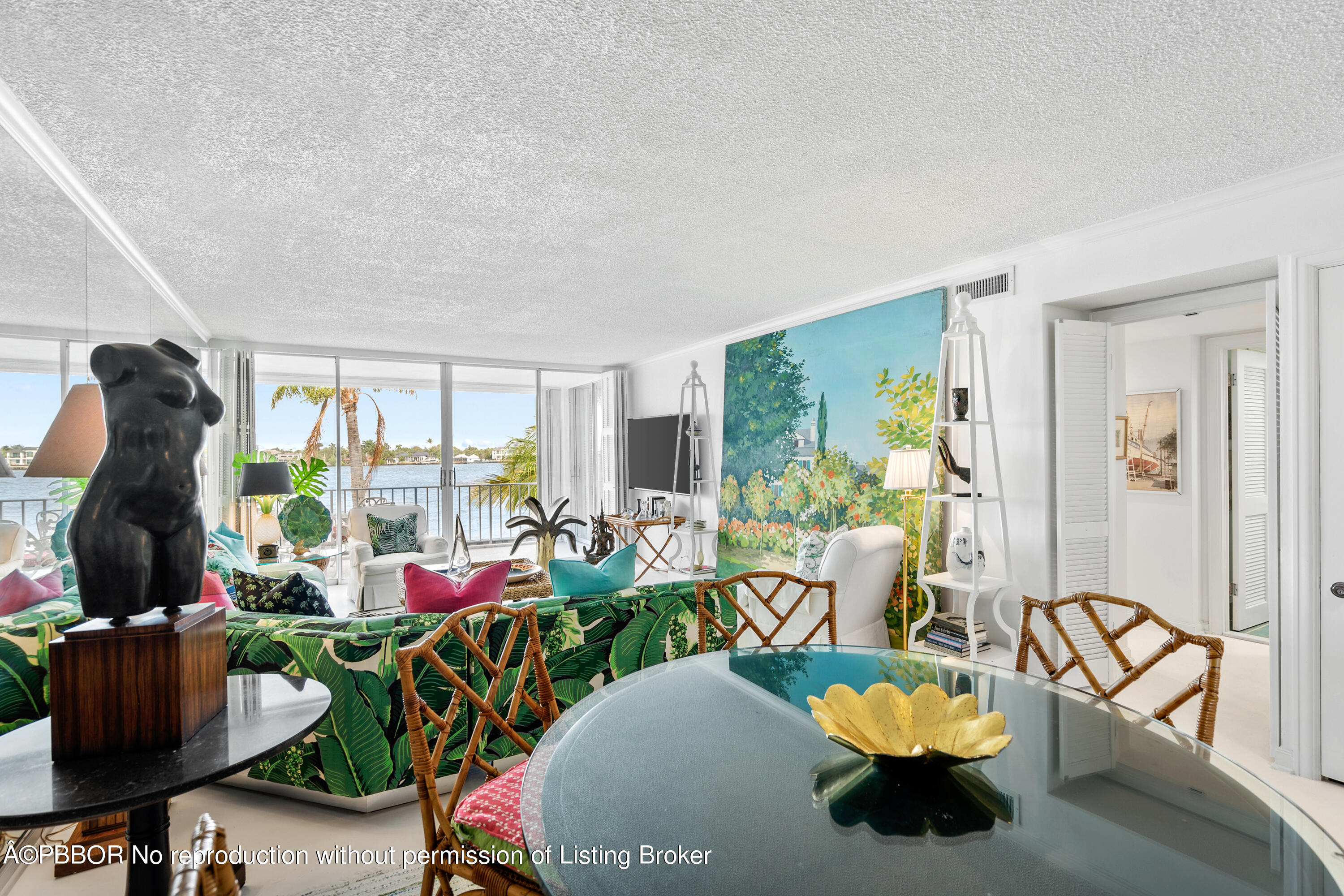 Undisclosed Address Palm Beach, FL 33480 - Photo 3 of 17 a living room with furniture and a potted plant