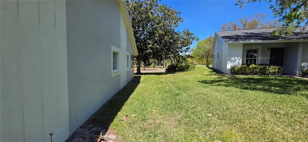 front view of a house with a big yard