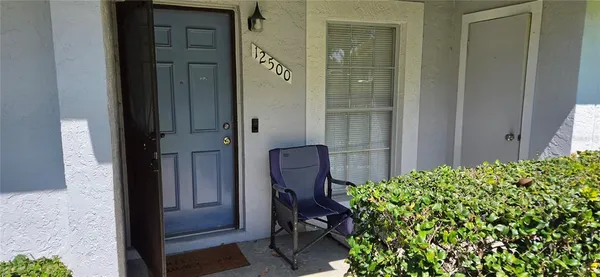 an empty room with a wooden door