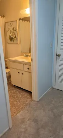 a kitchen with stainless steel appliances a refrigerator sink and cabinets