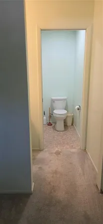 an empty room with a wooden floor