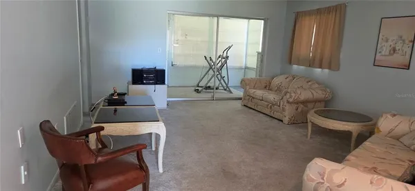 a bathroom with a toilet sink and shower