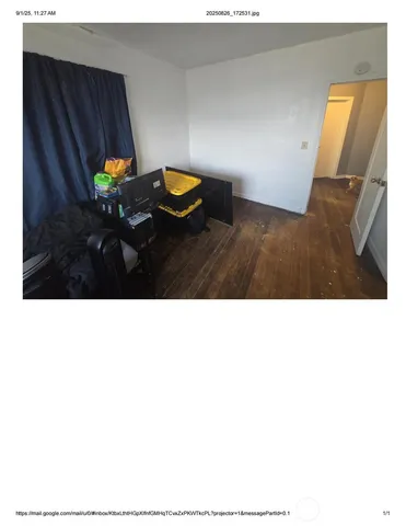 a living room with a rug