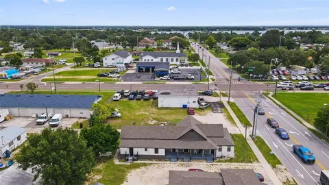 a view of a city with lawn chairs
