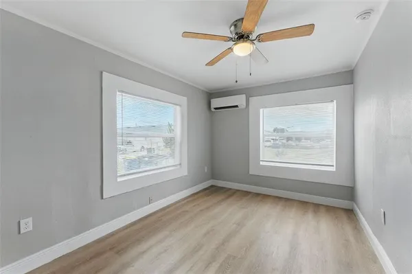 a view of an empty room with a window