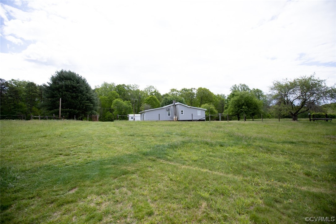 2515 Jerico Road Buckingham, VA 23921 - Photo 30 of 48 a backyard of a house with lots of green space