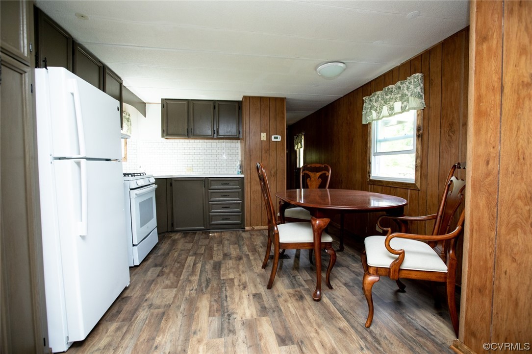 2515 Jerico Road Buckingham, VA 23921 - Photo 8 of 48 a kitchen with stainless steel appliances refrigerator dining table and chairs