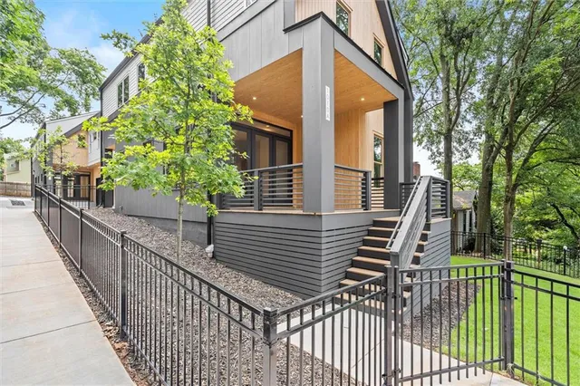a view of a house with large windows