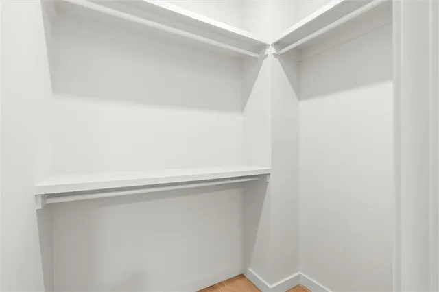 a view of a road with a garden