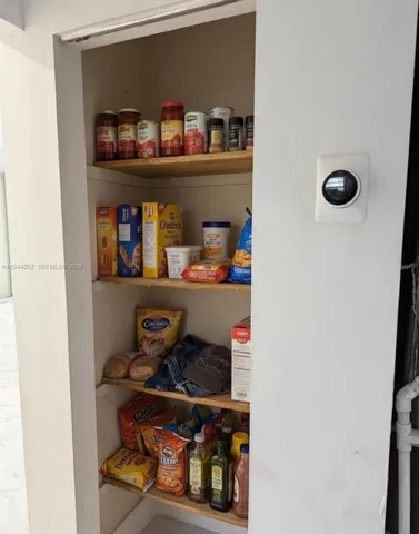 a room with storage and utility