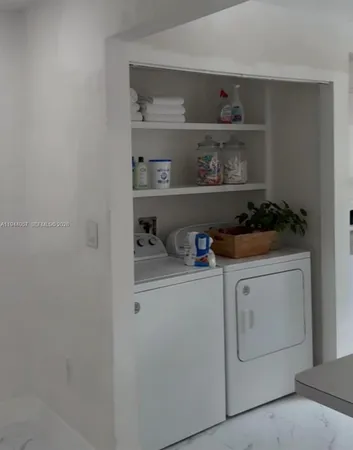 a kitchen with a cabinets and a stove