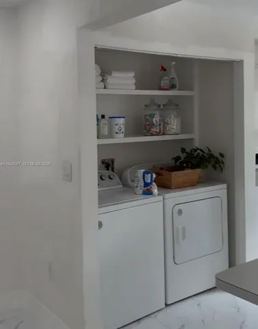 a kitchen with a cabinets and a stove