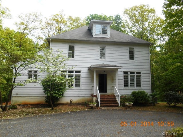 a front view of a house with a garage