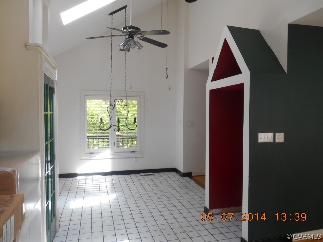 2913 Old Gun Road West Midlothian, VA 23113 - Photo 11 of 24 a view of empty room with wooden floor and fan