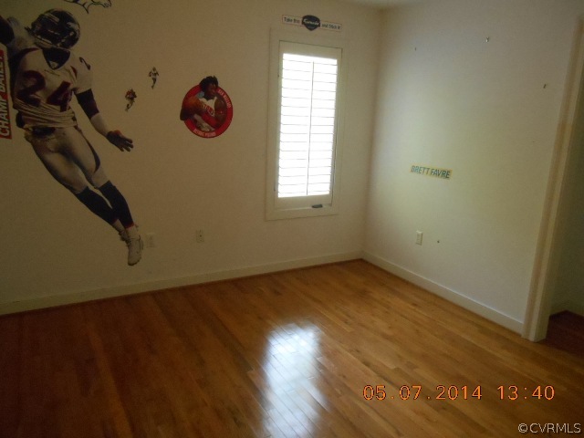 2913 Old Gun Road West Midlothian, VA 23113 - Photo 15 of 24 an empty room with wooden floor