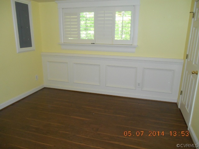 2913 Old Gun Road West Midlothian, VA 23113 - Photo 18 of 24 a view of an empty room with wooden floor and a window