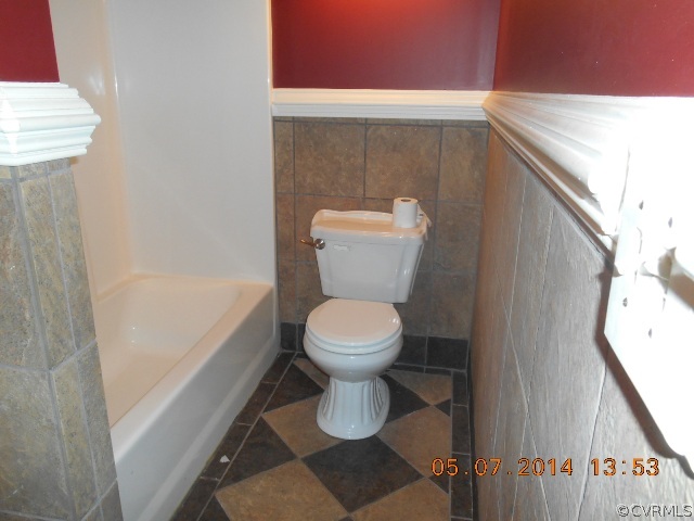 2913 Old Gun Road West Midlothian, VA 23113 - Photo 19 of 24 a bathroom with a toilet and a shower