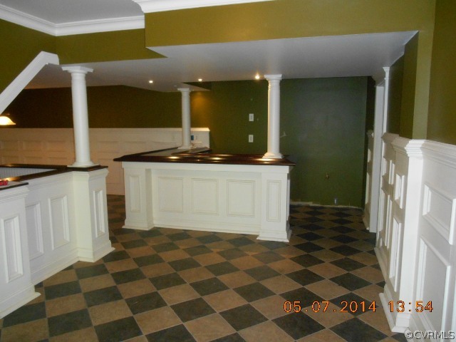 2913 Old Gun Road West Midlothian, VA 23113 - Photo 20 of 24 a kitchen with a checkered floor and white cabinets