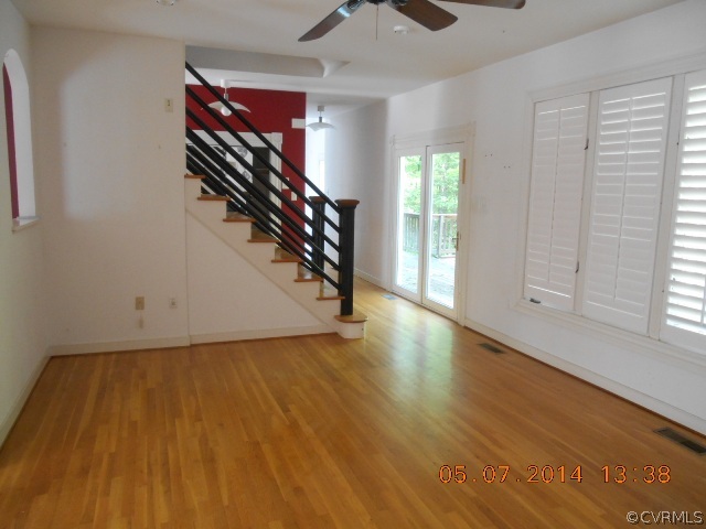 2913 Old Gun Road West Midlothian, VA 23113 - Photo 9 of 24 wooden floor in an empty room with a window