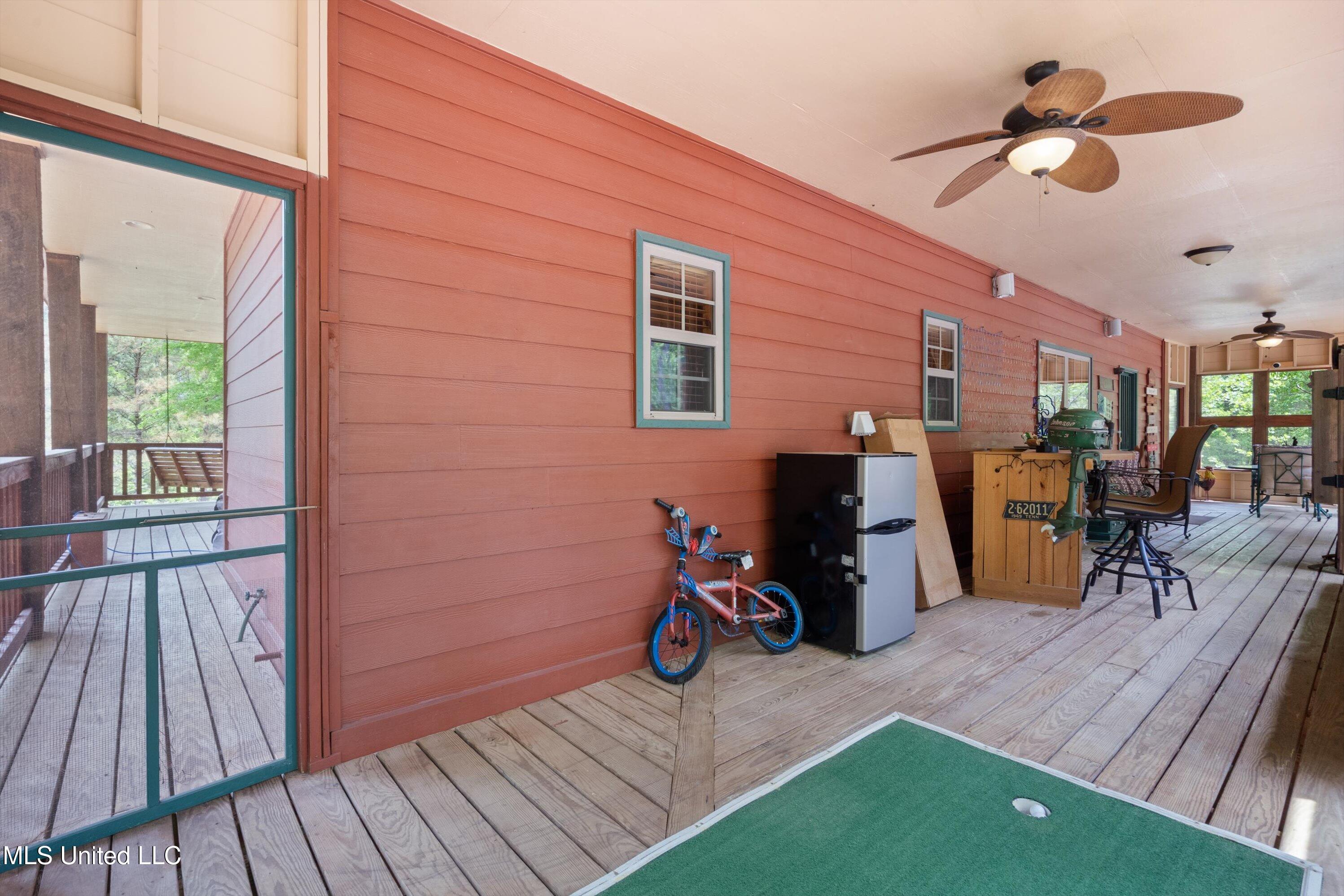 498 Chickasaw Ridge Pope, MS 38658 - Photo 23 of 43 Screened Rear Porch