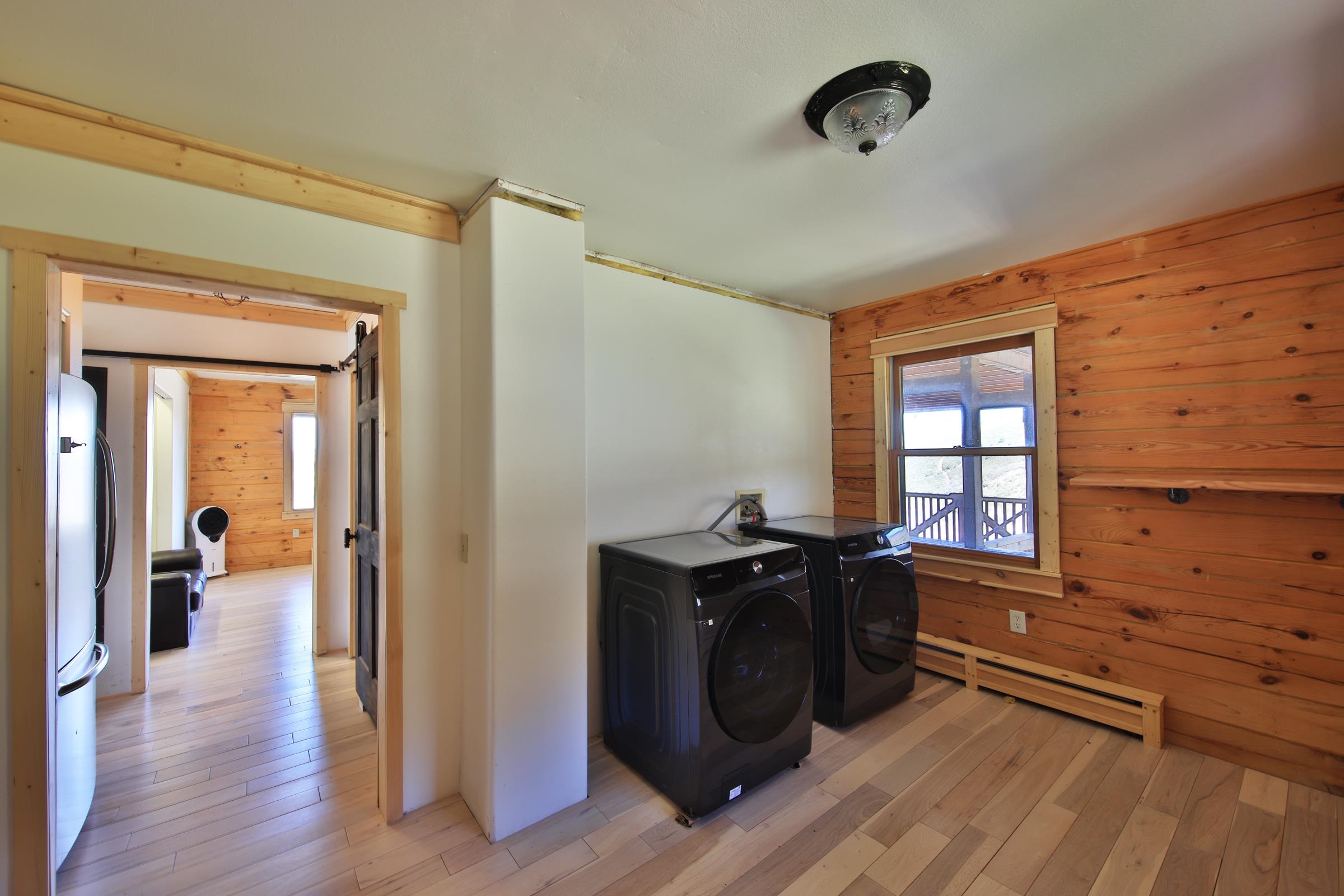 10822-60 60 75/100 Road Collbran, CO 81624 - Photo 17 of 42 a view of a livingroom with wooden floor and furniture
