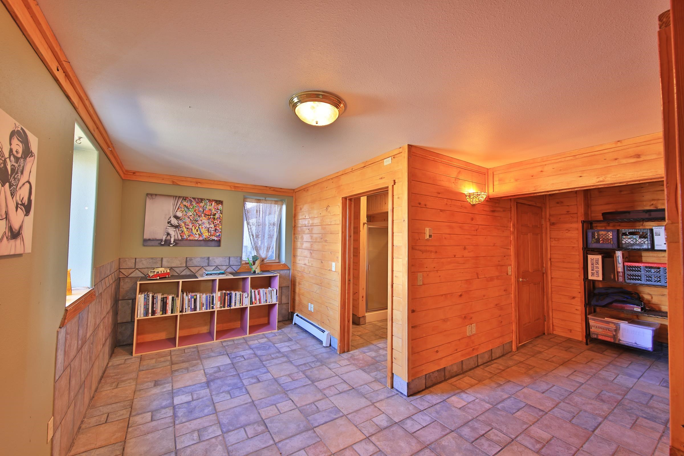 10822-60 60 75/100 Road Collbran, CO 81624 - Photo 22 of 42 a view of a livingroom with furniture and window