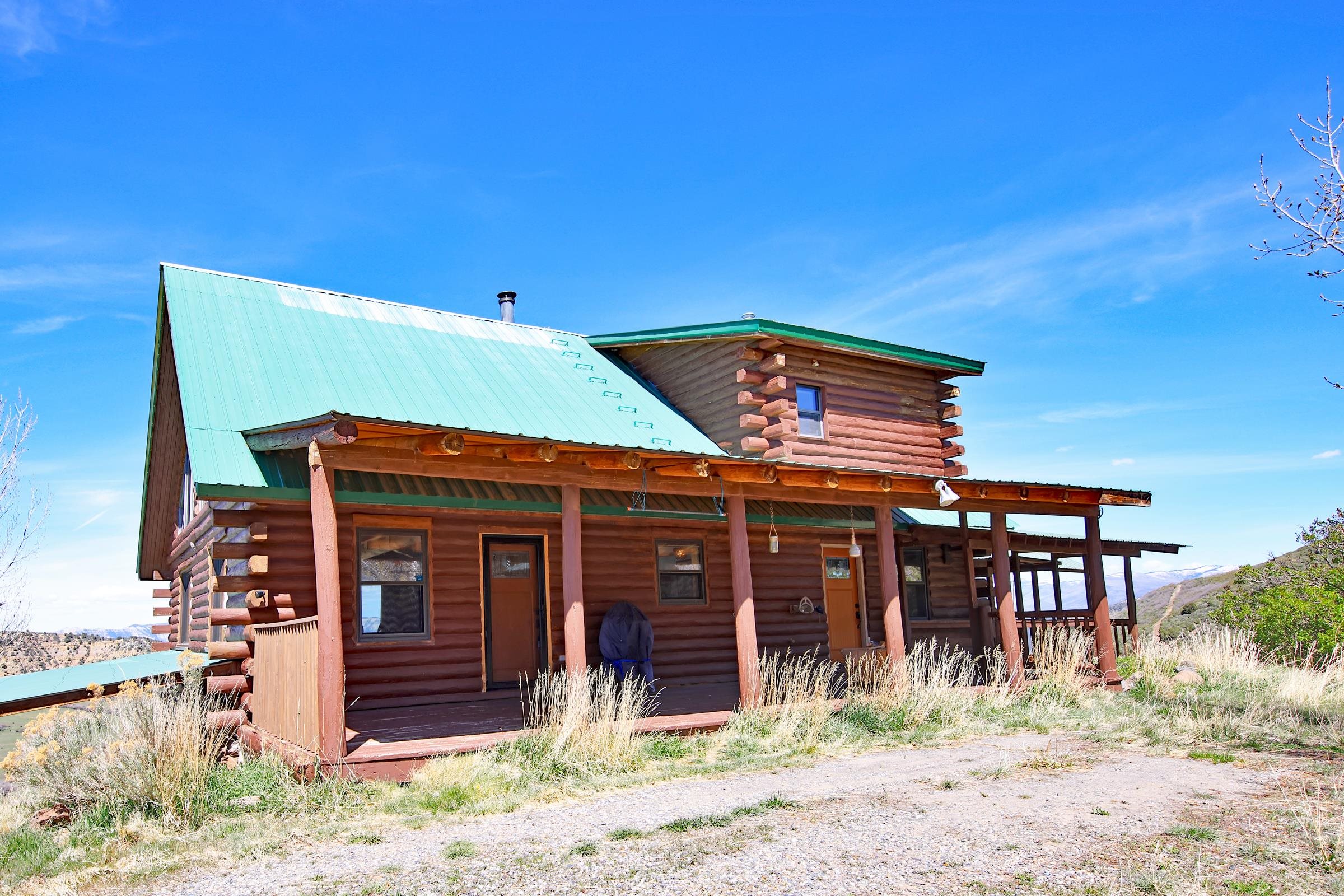 10822-60 60 75/100 Road Collbran, CO 81624 - Photo 8 of 42 a front view of a house